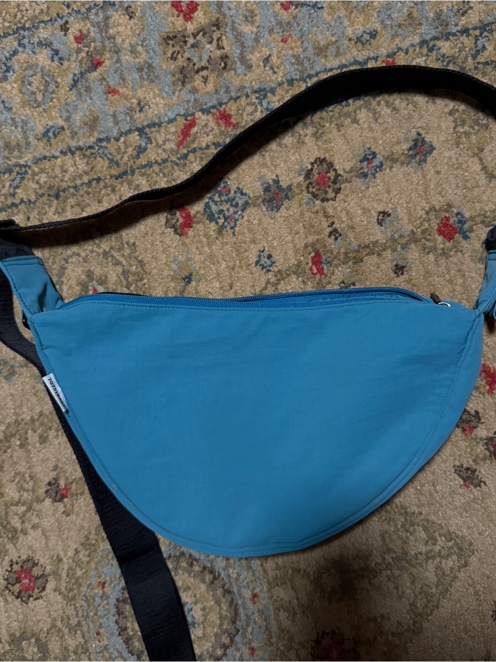 Crescent sling bag